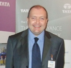 In a busy commercial building, where heating, ventilation and air-conditioning (HVAC) systems are consistently in use, the performance and durability of the pipework connecting system components is paramount to ensure the system’s performance as well as for ensuring the occupant’s health and safety. Exposed to a wide range of stresses, temperatures and pressures, steel tubes used within HVAC and building service applications need to meet specific requirements to ensure their reliability. For example, it is essential to take into account the fluid being conveyed, as this can often contribute to the deterioration of the tube in service. Extremes of acidity or alkalinity or high levels of oxygen within the system can result in corrosion. Furthermore, if high levels of calcium are present — often common in hard-water areas — build up and blockages within the pipework can occur. In such cases it is therefore essential to employ an appropriate fluid treatment in the pipework system. When considering the correct product for a HVAC application, the tube-manufacturing process is often ignored, with other factors such as the material specification or legislative compliance being considered more important. Yet the steel tube’s manufacturing process is actually vitally important in respect of its performance in service. Steel tubes used in building-services applications are normally ordered to BS EN10255, the successor to the old BS1387. However, whilst withdrawn in 2004, BS1387 is still commonly referenced, which can lead to procurement and compliance issues. Tubes to BS EN10255 can be produced by two notably different manufacturing processes — either hot-finished or cold-formed. Welded steel tubes produced in this way have markedly different physical properties which will affect their in-service performance, hence the importance of taking the manufacturing process into consideration. Cold-formed tubes are produced from steel strip that is formed and welded at ambient temperature to produce a cylindrical tube shape. Whilst undergoing this process, the material hardens, due to the cold working and the welding process, resulting in internal stresses being induced in the tube. The main stress occurs in the region adjacent to the weld seam, often referred to as the heat-affected zone (HAZ). Within this region, the steel has a distorted gain structure, caused by the heat input of the welding operation. This makes it harder and less malleable, and any subsequent fabrication or manipulation during installation may further increase the internal stress level, resulting in a greater risk of cracking or of failing in service due to an increased vulnerability to corrosion. Whilst the manufacturing process for hot-finished tubes may appear similar to that of cold formed, it includes one additional vital step that ensures the removal of any internal stresses. This involves induction or furnace heating of the tube to a very high temperature. As the temperature rises, the internal stresses in the steel are relaxed and the distorted grain structure of the heat-affected zone adjacent to the weld line is completely removed. As such, hot-finished tube products offer 10 benefits over their cold-formed counterparts. • A more ordered and consistent microstructure • No internal stress that can promote cracking • More consistent and reliable mechanical properties • Improved structural integrity and ductility • Improved and more consistent toughness • A higher pressure integrity • A greater factor of safety • No loss of strength due to additional welding or heating • An improved performance against corrosion • The ability to be threaded, grooved or bent to tight radii without splitting, creasing or collapsing Using the correct welded steel tube in building-services applications is therefore vital, and for this reason the better durability and reliability offered by hot-finished products should always be considered. Tata Steel’s Install Plus 235 brand, for example, provides a robust solution for such demanding conveyance applications. This multi-certified tube range ensures that each product is aligned with both the CE marking requirements of the Construction Products Regulations (CPR) and also the Pressure Equipment Directive (PED), by manufacturing to both BS EN10255 and BS EN10217 Part 2. It is important to note that only by requesting an BS EN10217 Part 2 product, can you guarantee that a hot-finished or ‘GH’ (Get Hot) steel tube will be supplied. To highlight the importance of tube manufacturing and raise awareness of pipework related issues, Tata Steel, in collaboration with the School of Civil & Building Engineering at Loughborough University, has established the Building & Industrial Services Pipework Academy (BISPA). This supports the building and industrial services industry by offering training courses and CPD programmes focused on a range of industry issues, including tube specifications and the benefits of hot-finished products. Therefore, when considering what tube to use for a building-services application, looking beyond the specification to the manufacturing process is strongly recommended. Remember, not all steel tubes are the same. Hot-finished steel tubes can provide an unparalleled level of reliability and durability within pipework systems, delivering safety and performance benefits as well as a longer life. Stewart Jones is senior customer technical services field engineer for conveyance tubes at Tata Steel.